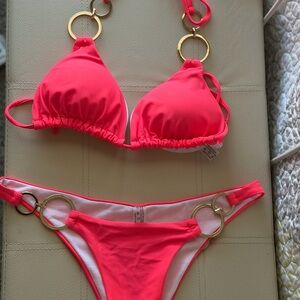 Vibrant Pink Bikini with Gold Ring Accents